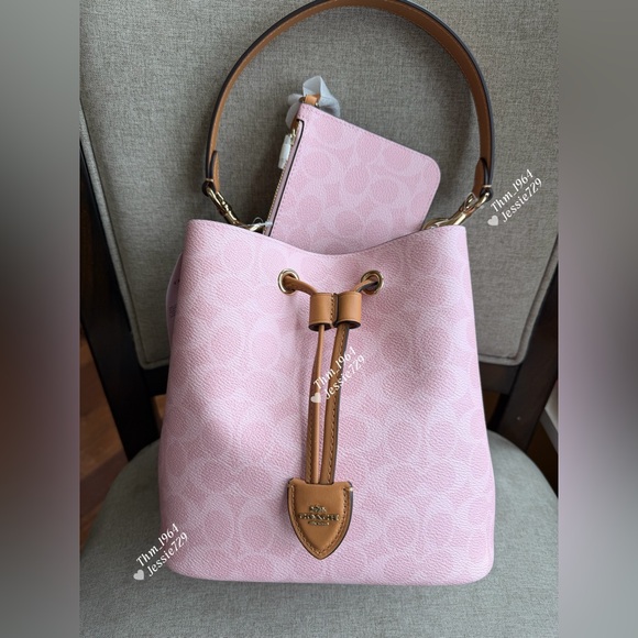 Coach Handbags - NWT！COACH Rowan Bucket Bag In Signature Canvas With Charms（CEA23）fast shipping